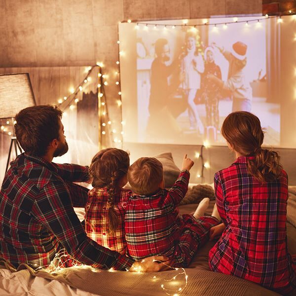 Family watching Christmas movie