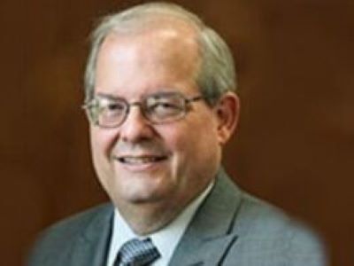 Pastor John Stoos