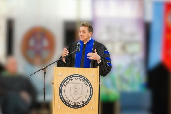 Photo of Dr. Greg Seltz speaking at Concordia Univserity Graduation in Ann Arbor Michcigan