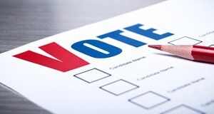 Lawrence calls for local partisan elections, raising objections from cities