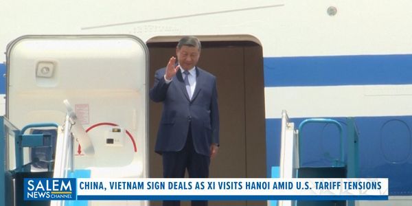 China, Vietnam Sign Deals As Xi Visits Hanoi Amid U.S. Tariff Tensions