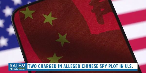 2 Chinese Nationals Charged with Spying Inside the U.S. for Beijing, Justice Department Says