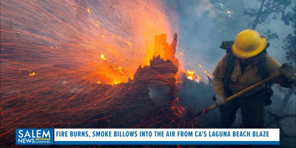 Fire Burns, Smoke Billows Into Air From CA's Laguna Beach Blaze