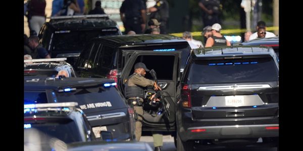 Suspected gunman and police officer dead in shooting near CDC
