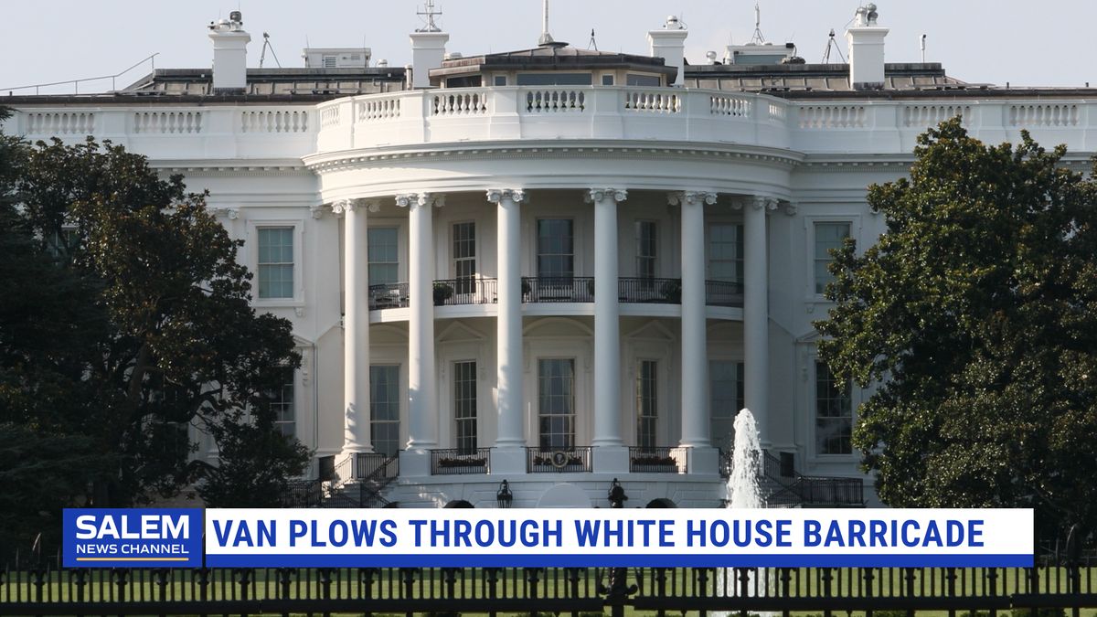 Van plows through White House barricade, driver detained