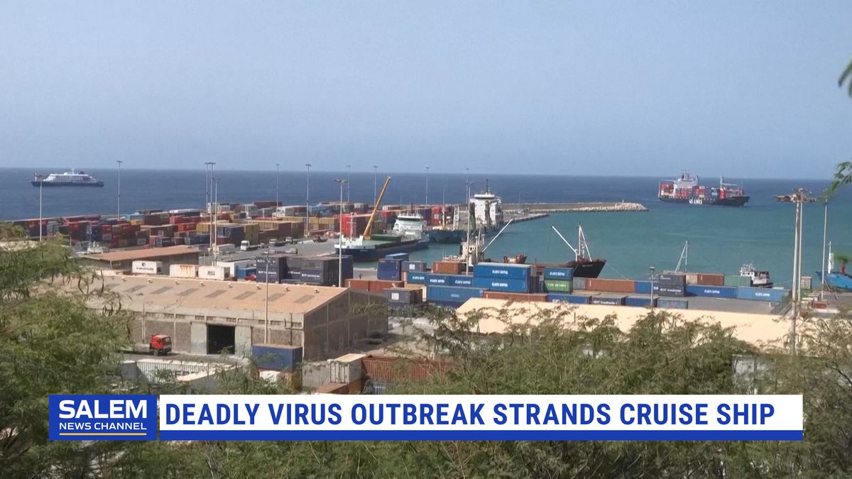 Spain clears virus-stricken cruise ship to dock after deadly outbreak