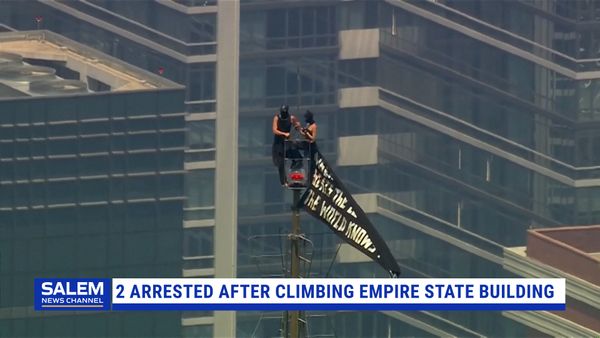 2 Arrested After Hanging Banner On Empire State Building Antenna