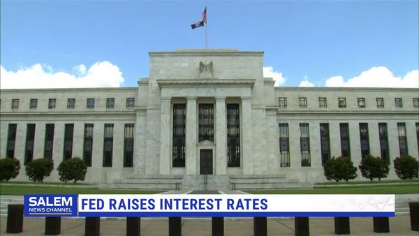 Fed Hikes Key Rate By Quarter-Point