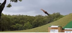 A Woman Does a Huge Backflop on a Waterslide
