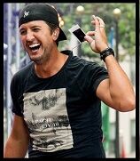 Rain And A Wardrobe Malfunction Keeps Luke Bryan Going! 