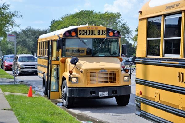 PTA Creates Hilarious Signs To Keep School Car Line Moving