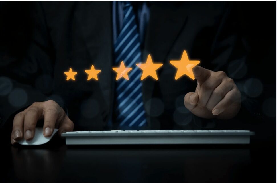 A business professional engages with a five-star rating on a digital screen, symbolizing online reputation management. Salem Surround boosts businesses’ credibility and visibility through strategic review management.