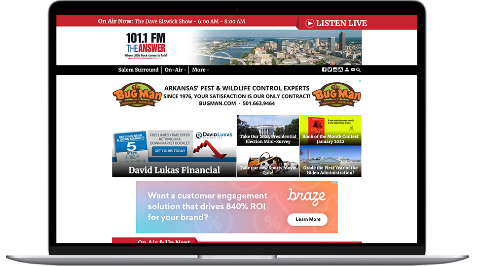 A laptop featuring a Little Rock radio website