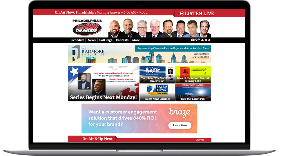 A laptop featuring a Philadelphia radio website