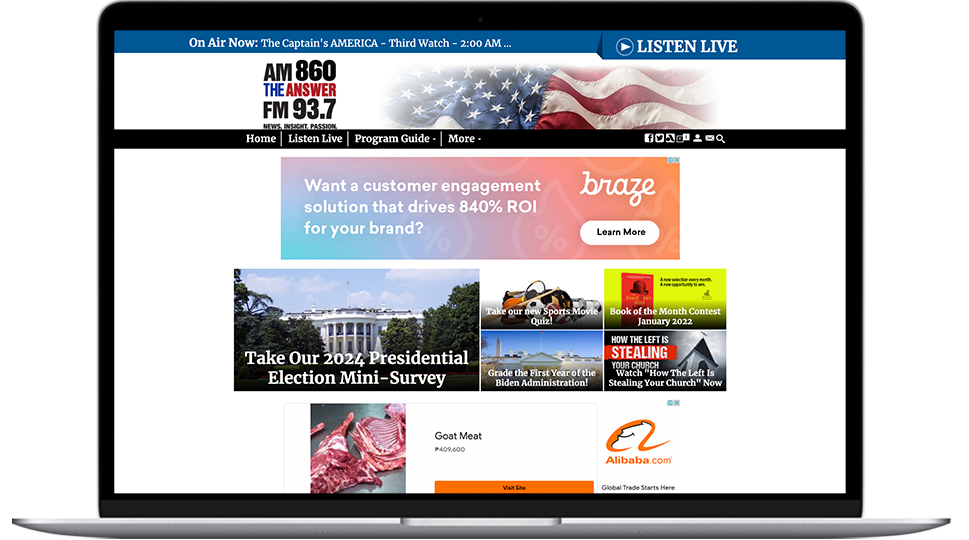 A laptop featuring a Tampa radio website
