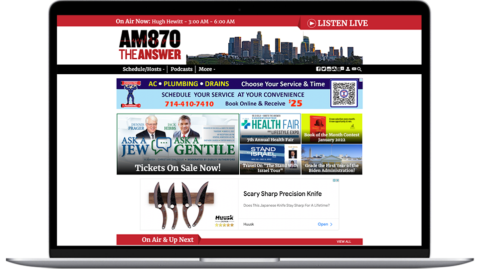 A laptop featuring a LA radio website