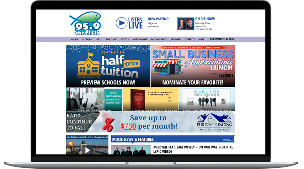 A laptop featuring a OC radio website