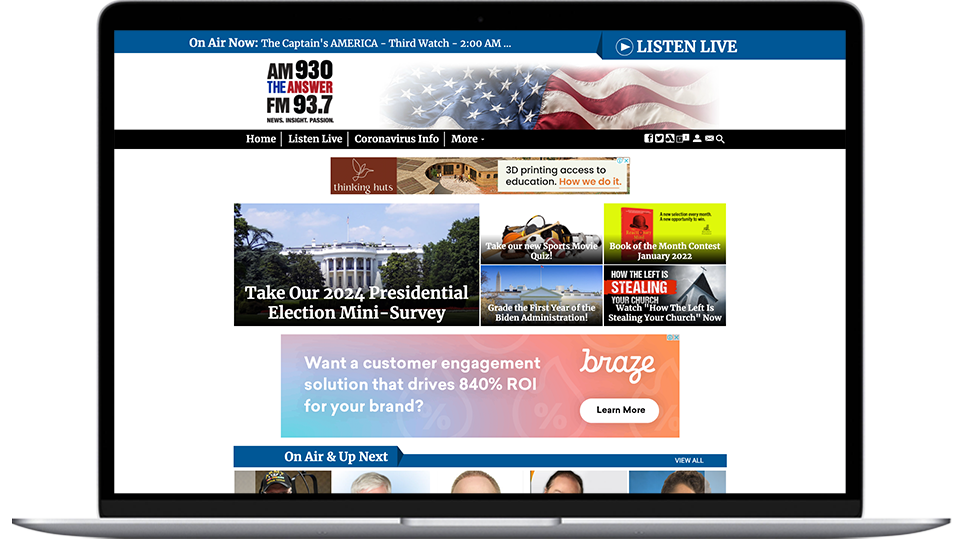 A laptop featuring a Sarasota radio website
