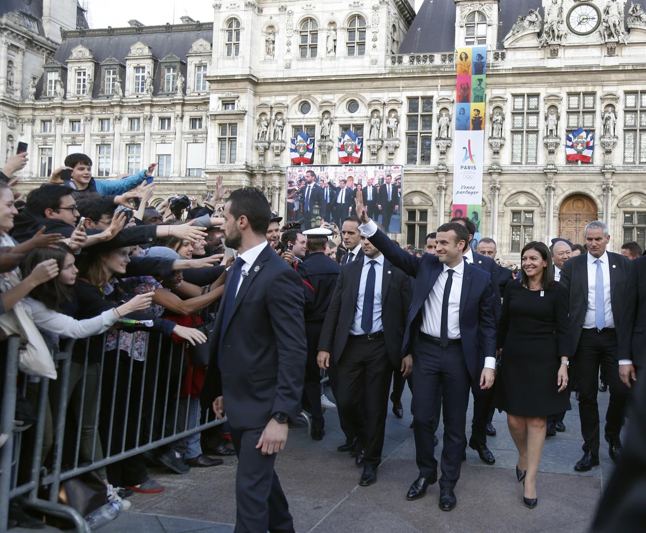 busy-day-for-french-president-names-pm-meets-with-merkel-am-1070