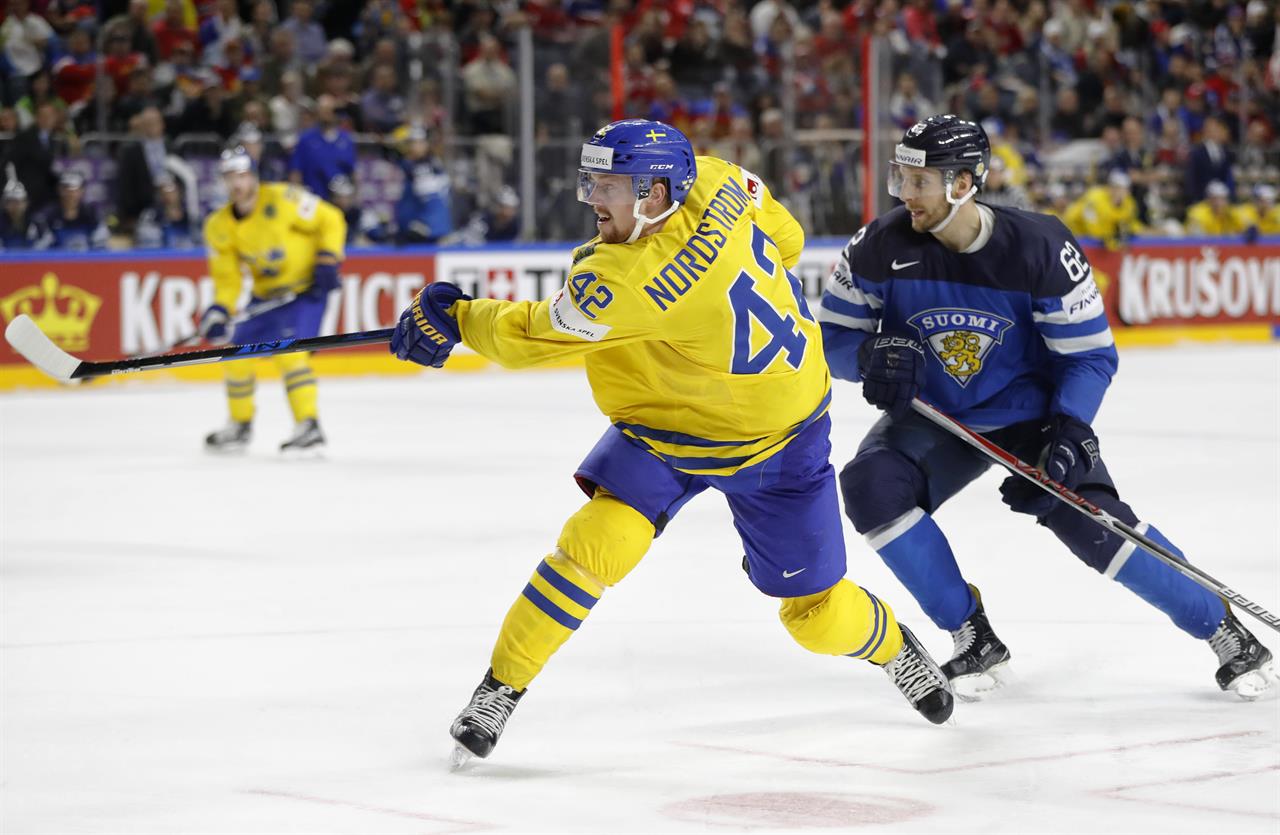 Canada stuns Russia for ice hockey worlds final vs. Sweden ...