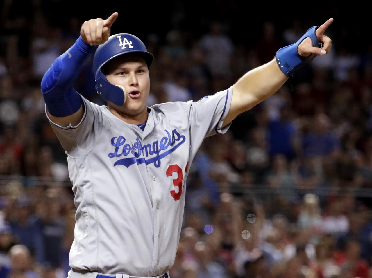 Dodgers win 80th game of season, rallying over