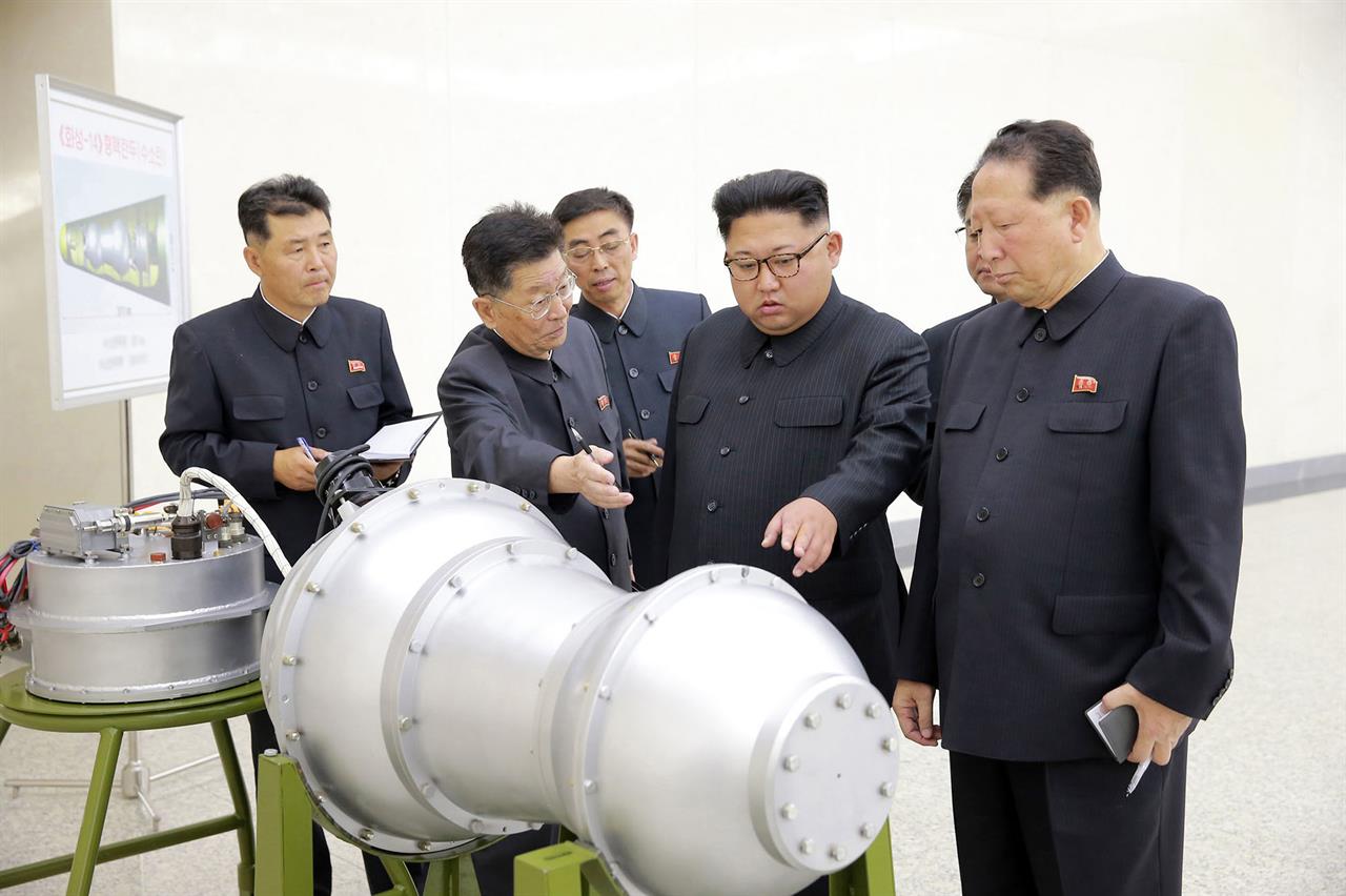 In this undated image distributed on Sunday, Sept. 3, 2017, by the North Korean government, shows North Korean leader Kim Jong Un at an undisclosed location. North Korea’s state media on Sunday, Sept 3, 2017, said leader Kim Jong Un inspected the loading of a hydrogen bomb into a new intercontinental ballistic missile, a claim to technological mastery that some outside experts will doubt but that will raise already high worries on the Korean Peninsula. Independent journalists were not given access to cover the event depicted in this image distributed by the North Korean government. The content of this image is as provided and cannot be independently verified. (Korean Central News Agency/Korea News Service via AP)