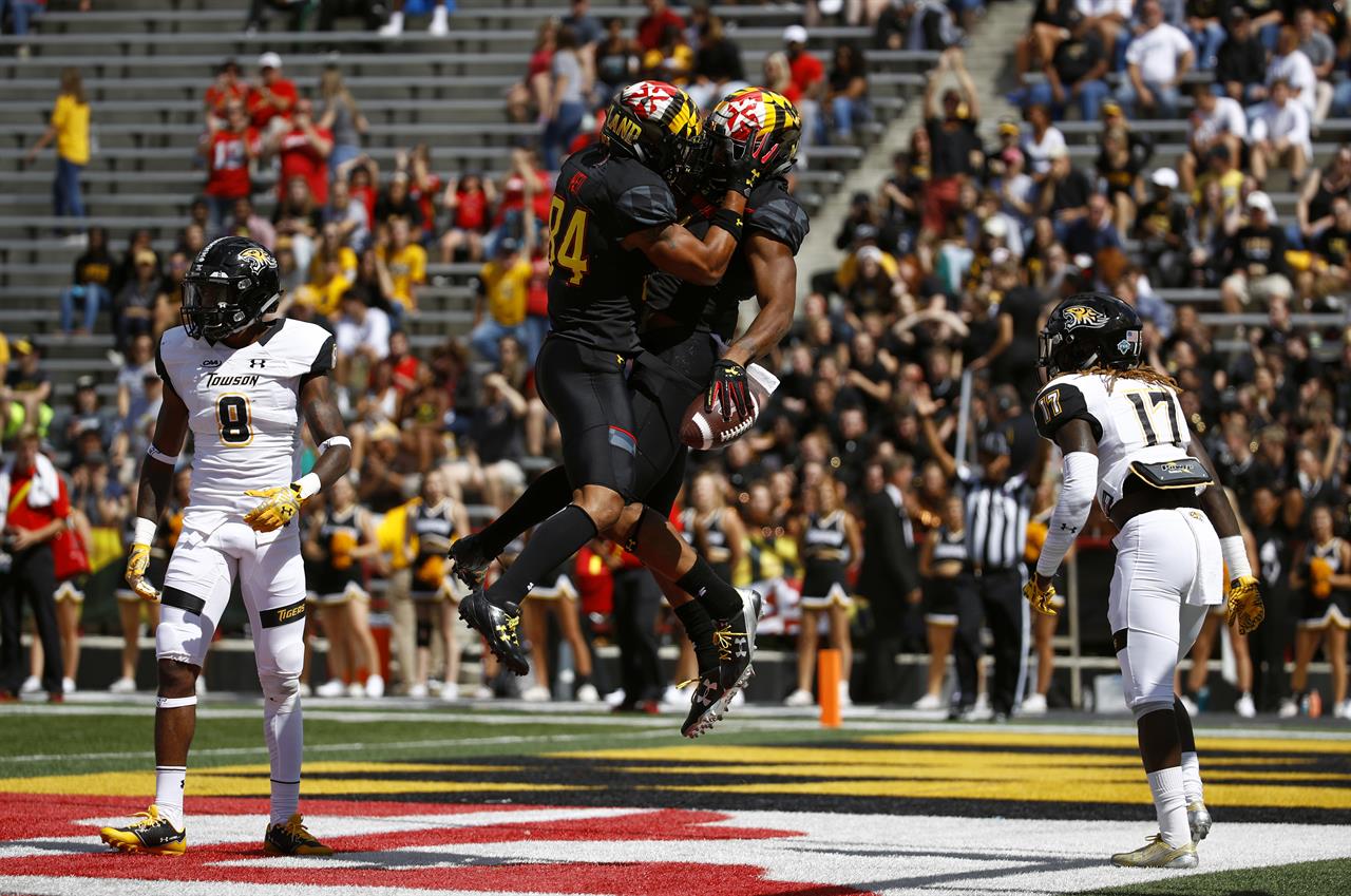 Moore Scores 3 Tds To Help Maryland Roll Past Towson 63 17