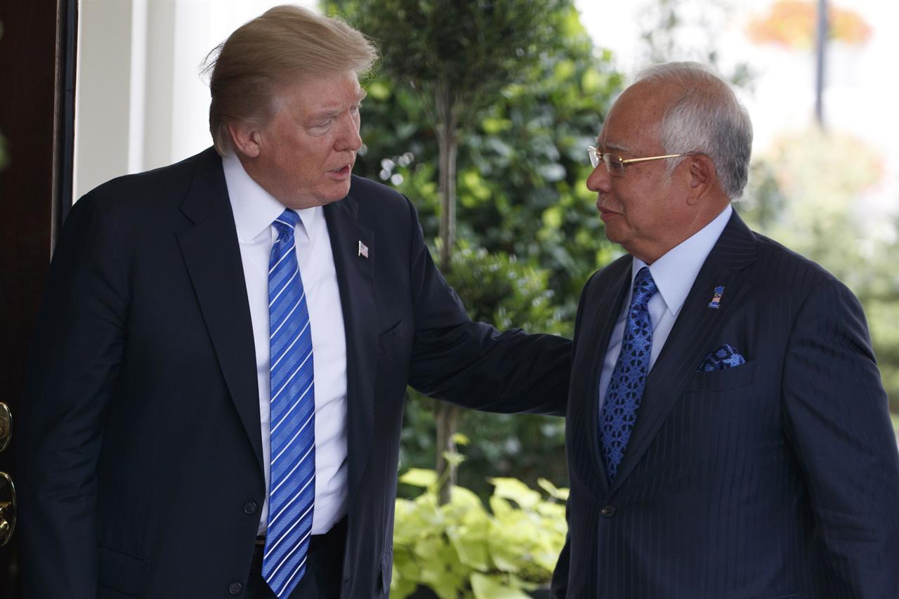 AP Explains: 1MDB graft scandal heats up Malaysia politics ...