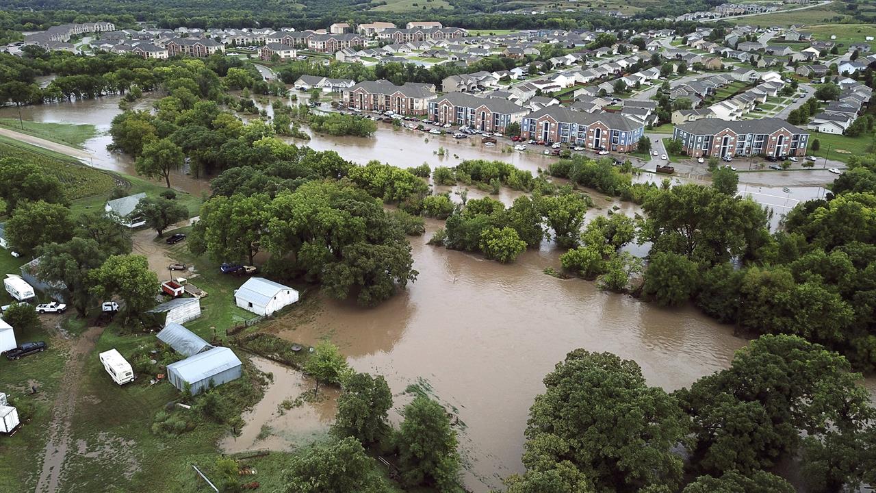 Over 300 people evacuated from flooded Kansas college town | 710 KNUS ...