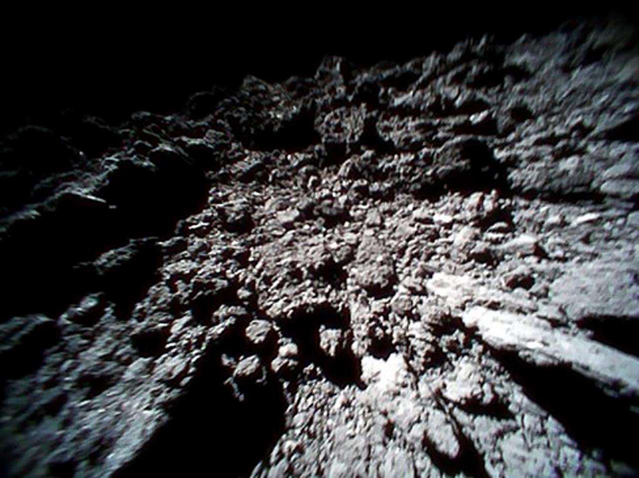Photos from Japanese space rovers show asteroid is ... rocky | Money 105.5 FM ...