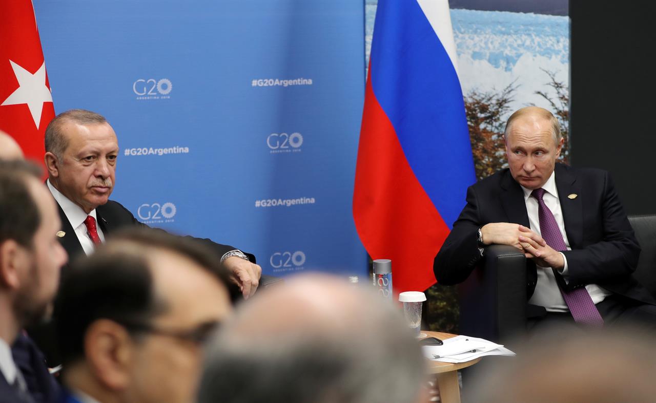Russian President Vladimir Putin, right, and Turkey's President Recep Tayyip Erdogan, attend talks at the G20 summit in Buenos Aires, Argentina, Saturday, Dec. 1, 2018. (Mikhail Klimentyev, Sputnik, Kremlin Pool Photo via AP)