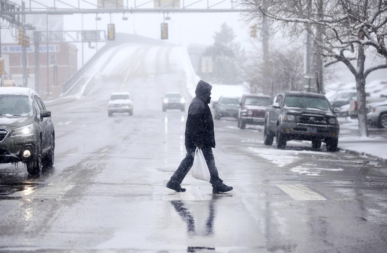 Bomb cyclone storm hammering central US, disrupting travel | Money 105. ...