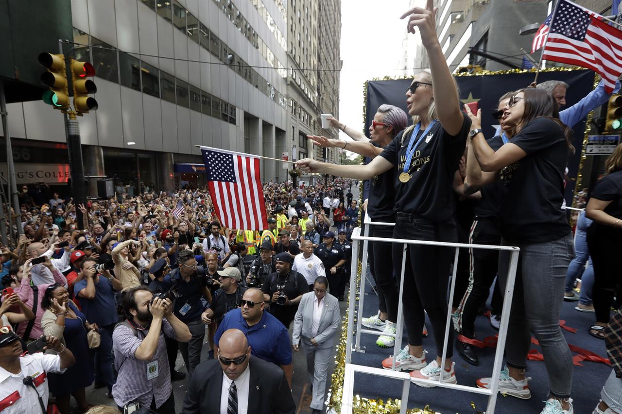 The U.S. women's soccer team, including Megan Rapinoe, far left on float, is celebrated with a parade along the Canyon of Heroes, Wednesday, July 10, 2019. in New York. The U.S. national team beat the Netherlands 2-0 to capture a record fourth Women's World Cup title. Wednesday, July 10, 2019. (AP Photo/Richard Drew)
The Latest: Soccer federation head: Women deserve fair pay