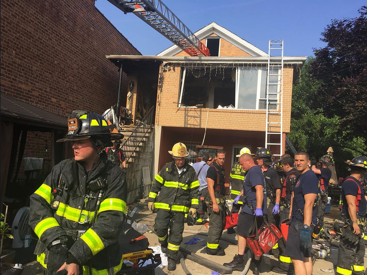 In this photo provided by the Fire Department of the City of New York, firefighters work the scene of a fatal house fire in the Queens borough of New York, Wednesday, July 10, 2019. Officials say that a 2-year-old girl died in the fire and two others were seriously injured. About 100 firefighters responded to the blaze. (FDNY via AP)
3 dead, 2 seriously injured in house fire
