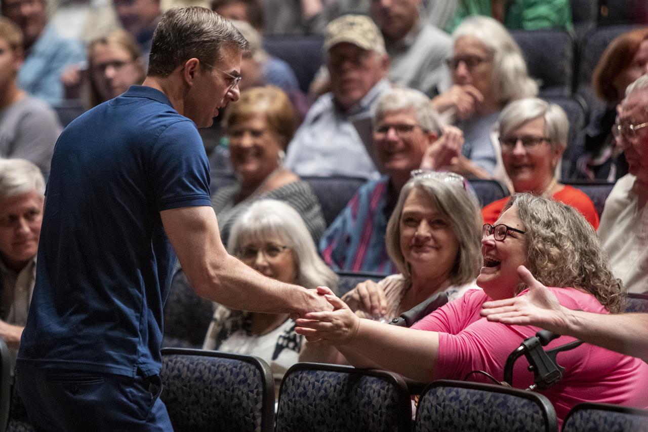 FILE - In this May 28, 2019, file photo, Rep. Justin Amash, D-Mich., greets the crowd before holding a town hall meeting at Grand Rapids Christian High School's DeVos Center for Arts and Worship. Democrats may be the biggest winners from Amash’s impeachment stand against President Donald Trump. Amash has left the Republican Party, is running for re-election as an independent and is flirting with a White House bid as a libertarian _ a threat that could wound Trump one more time. (Cory Morse/The Grand Rapids Press via AP)
Amash dumped Trump, and now Mich. district may dump Amash