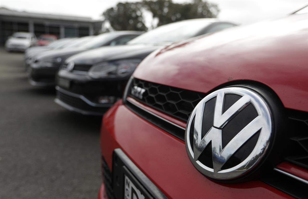 Display cars are parked at a Volkswagen dealership in Sydney, Monday, Sept. 16, 2019. Volkswagen has agreed to pay up to 127 million Australian dollars ($87 million) to settle an Australian class action stemming from the 2015 diesel emissions scandal, the German automaker and a lawyer said Monday. (AP Photo/Rick Rycroft)
Volkswagen to pay up to $87 million in Australia for scandal