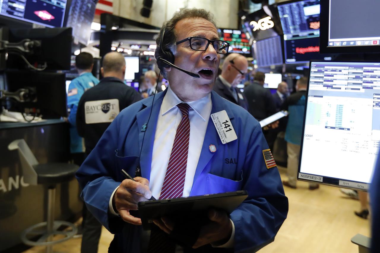 FILE - In this Oct. 30, 2019, file photo trader Sal Suarino works on the floor of the New York Stock Exchange. The U.S. stock market opens at 9:30 a.m. EST on Wednesday, Nov 6. (AP Photo/Richard Drew, File)
Asian stocks mostly lower after US indexes hit pause