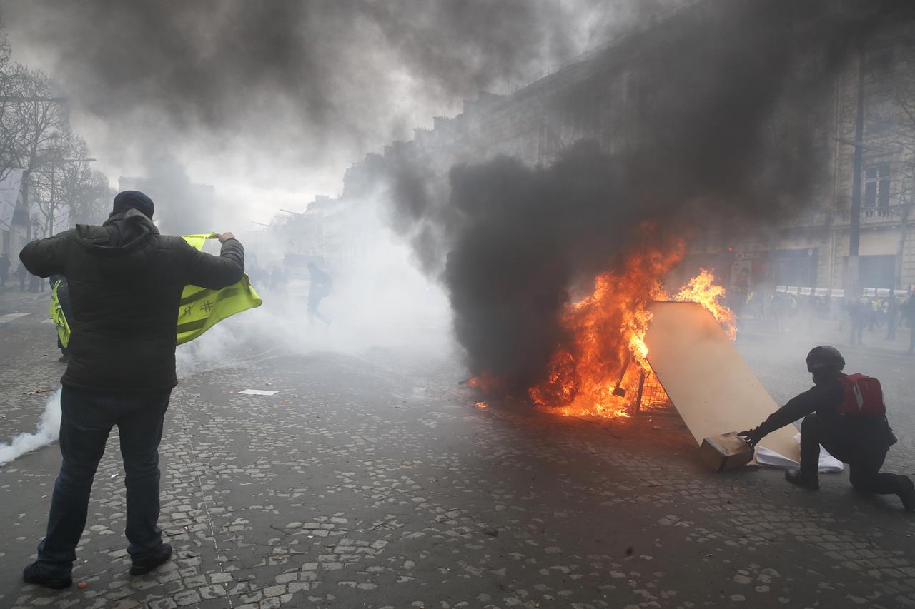 French Protesters Riot In Paris Accuse Macron Of Hot Air