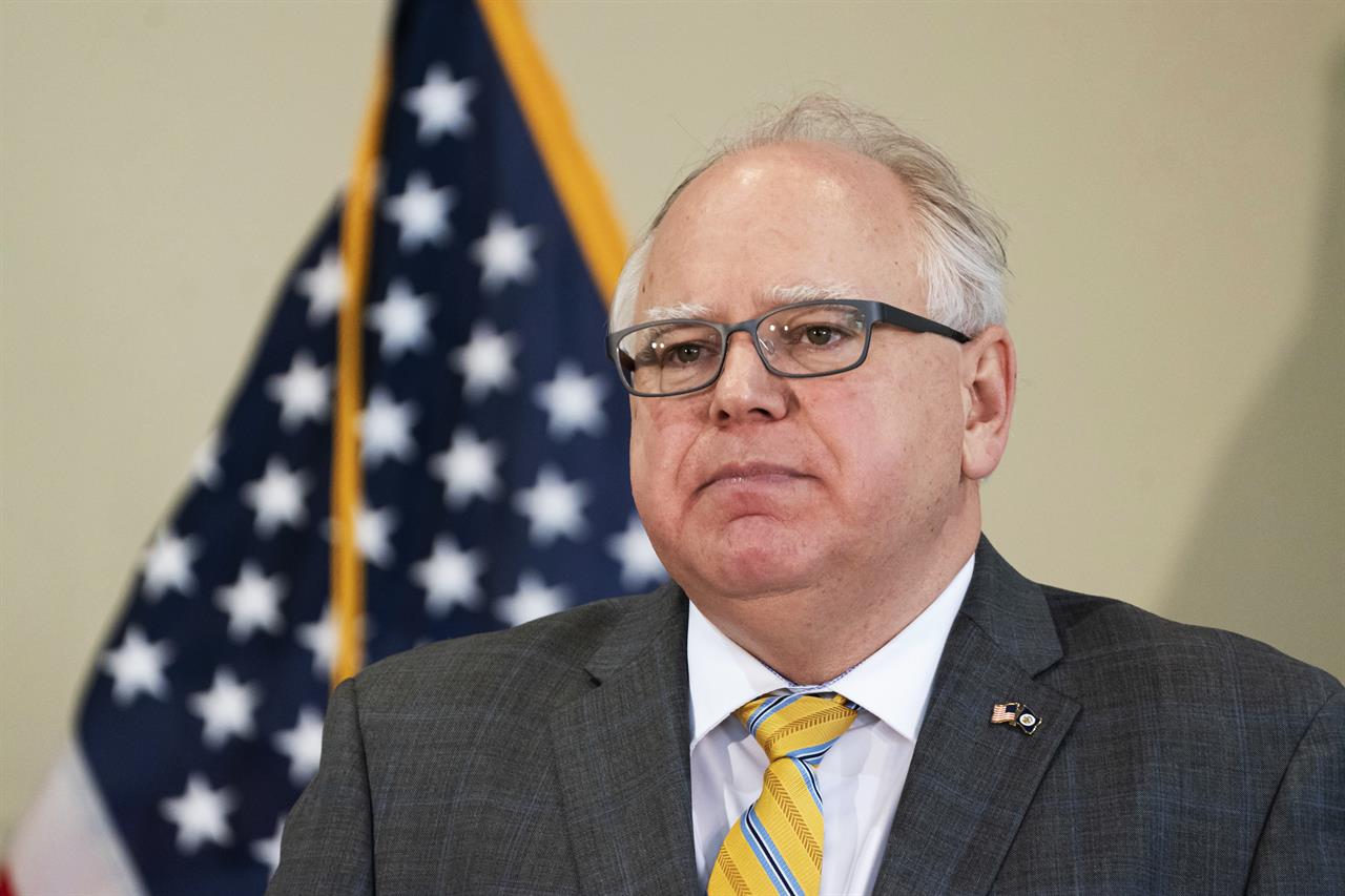 FILE - In this Friday, May 29, 2020, file photo, Minnesota Gov. Tim Walz speaks during a news conference in St. Paul, Minn., as he talks about the unrest in the wake of the death of George Floyd in the custody of Minneapolis police. Democratic governors say they want a bipartisan statement from all governors opposing President Donald Trump's threatened deployment of the U.S. military to quell unrest stemming from protests over the death of George Floyd. (Glenn Stubbe/Star Tribune via AP, Pool, File)
Democratic governors to GOP counterparts: oppose deployment