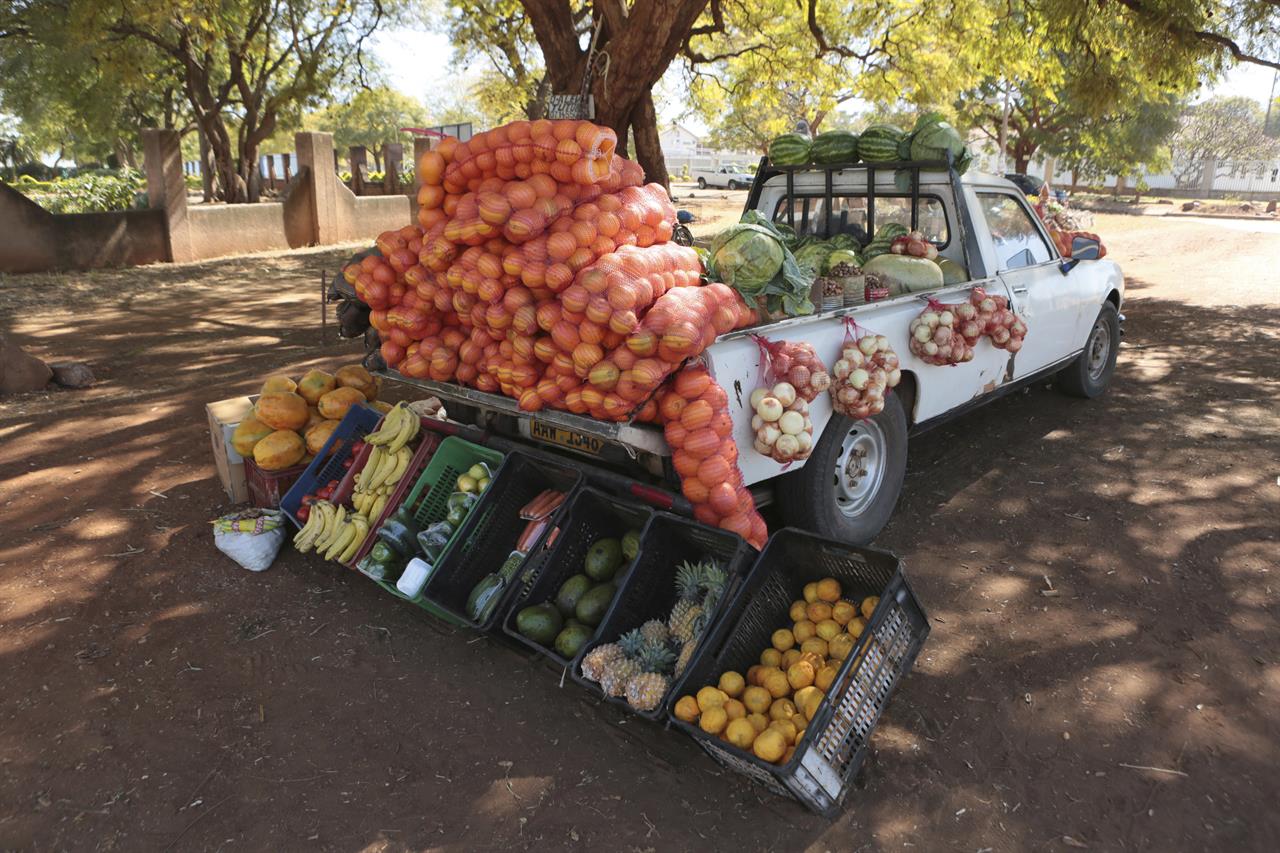 Many Zimbabweans sell goods from their cars in hard times AM 970 The