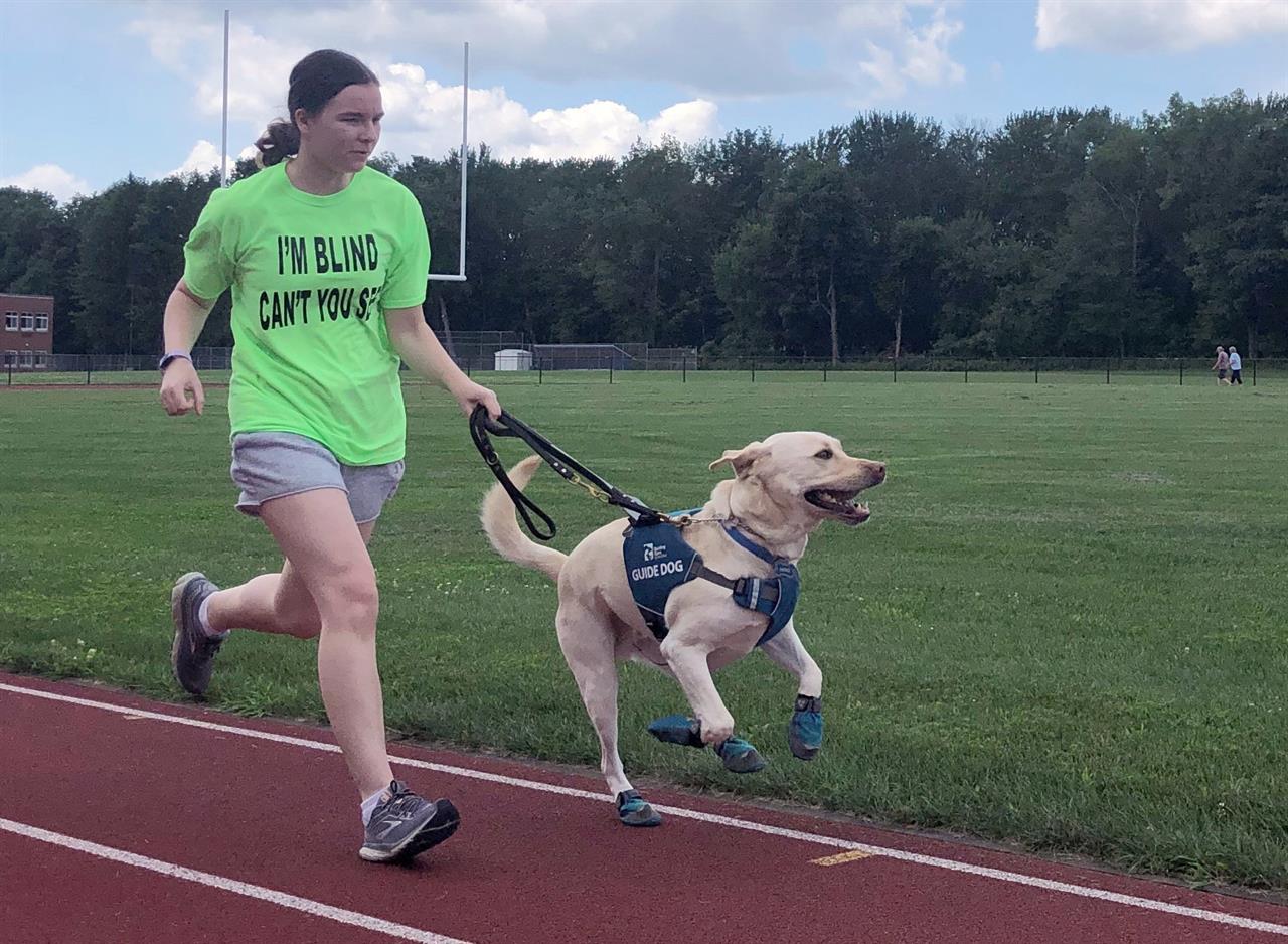 Guide dogs helping blind runners stay fit despite pandemic