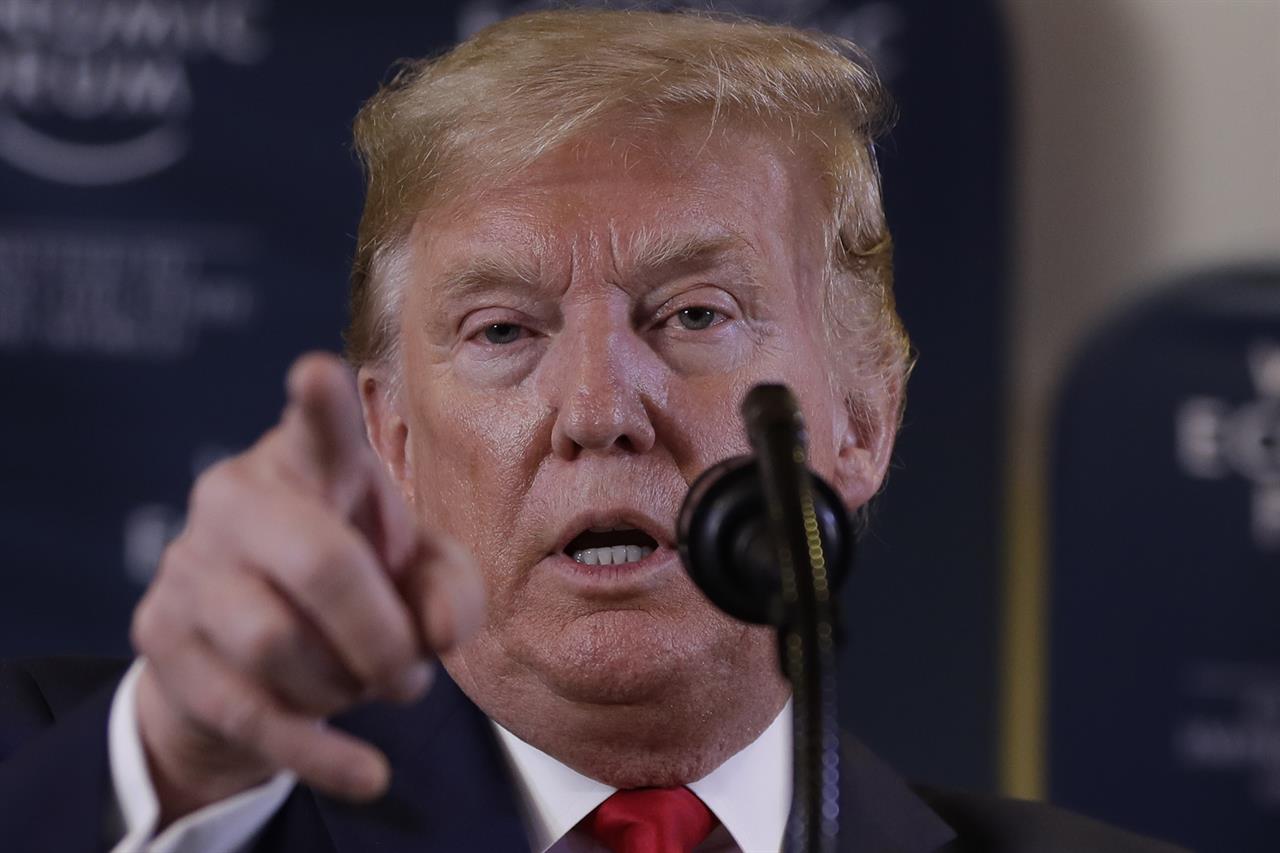 US President Donald Trump speaks during a news conference at the World Economic Forum in Davos, Switzerland, Wednesday, Jan. 22, 2020. Trump's two-day stay in Davos is a test of his ability to balance anger over being impeached with a desire to project leadership on the world stage. (AP Photo/Evan Vucci)
Holding court in Davos, Trump distracted by impeachment