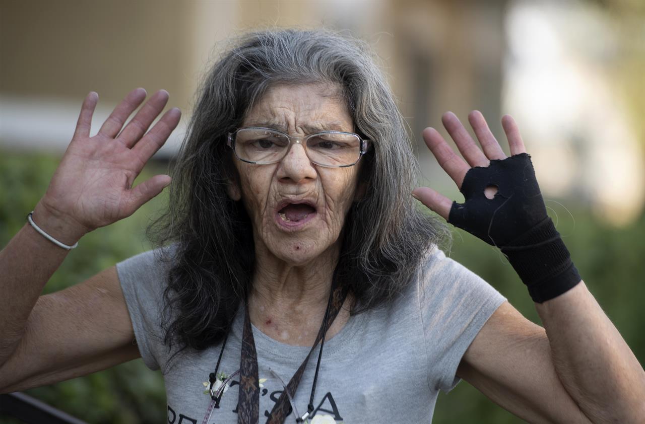 "I'm the master of assassination," Lorenza Marrujo, 67, says when asked about her martial arts skills at her Fontana, Calif., apartment home Wednesday, Sept. 30, 2020. Marrujo, who likes to be called “Lady Ninja” and has a black belt in ju jitsu, said she was in her third-floor apartment Monday when she heard screams coming from a neighbor's apartment and went to investigate. There, she said, she found another neighbor attacking her 87-year-old friend, Elizabeth McCray. Marrujo came to her rescue. (Cindy Yamanaka/The Orange County Register/SCNG via AP)
'Lady Ninja' pummels assailant who attacked elderly friend