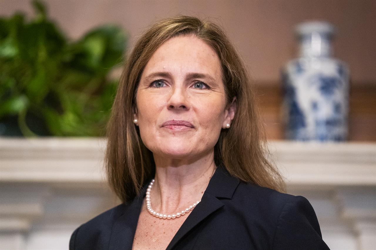 Supreme Court nominee Amy Coney Barrett meets with Sen. Martha McSally, R-Ariz., not pictured, Wednesday, Oct. 21, 2020, on Capitol Hill in Washington. (Jim Lo Scalzo/Pool via AP)