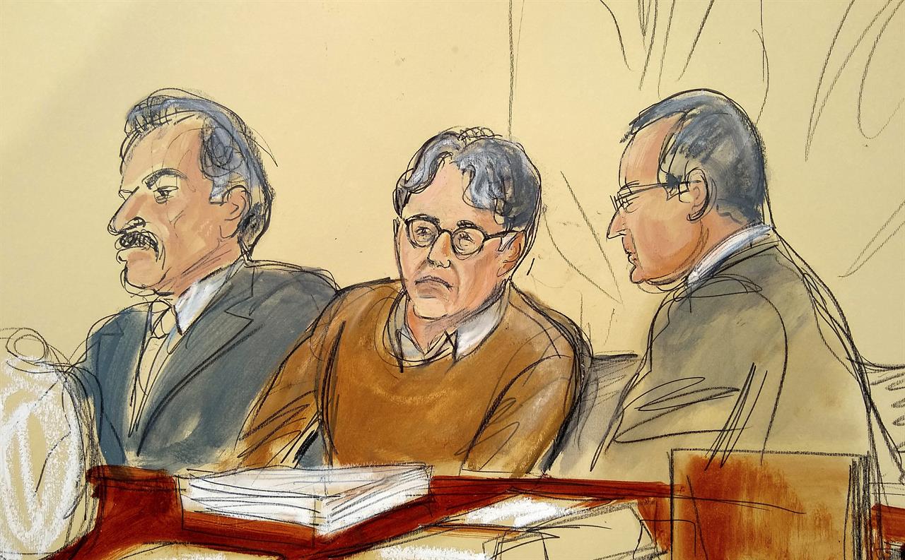 FILE - In this Tuesday, May 7, 2019, file courtroom drawing, defendant Keith Raniere, center, leader of the secretive group NXIVM, is seated between his attorneys Paul DerOhannesian, left, and Marc Agnifilo during the first day of his sex trafficking trial. Raniere, a self-improvement guru whose organization NXIVM attracted millionaires and actresses among its adherents, faces sentencing Tuesday, Oct. 27, 2020, on convictions that he turned some female followers into sex slaves branded with his initials. (Elizabeth Williams via AP, File)