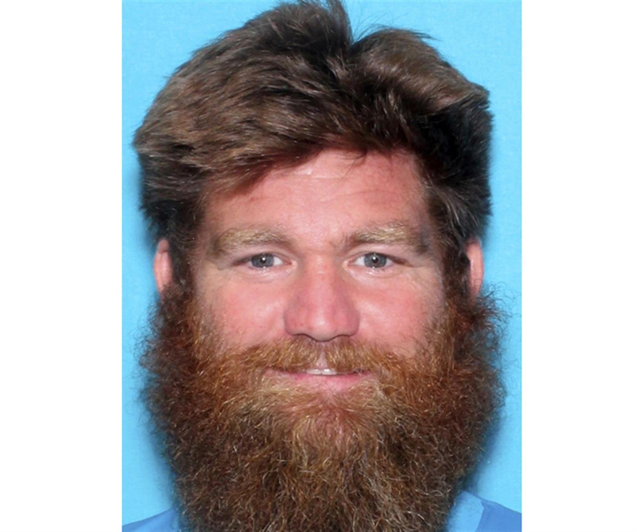This photo provided by the Kansas Bureau of Investigation shows Donny Jackson. Authorities are looking for two girls who were abducted from a Kansas home where two boys were found dead Saturday, Oct. 24, 2020. An Amber Alert said the suspect in the abduction is the girls' father, 40-year-old Donny Jackson. (Kansas Bureau of Investigation via AP)