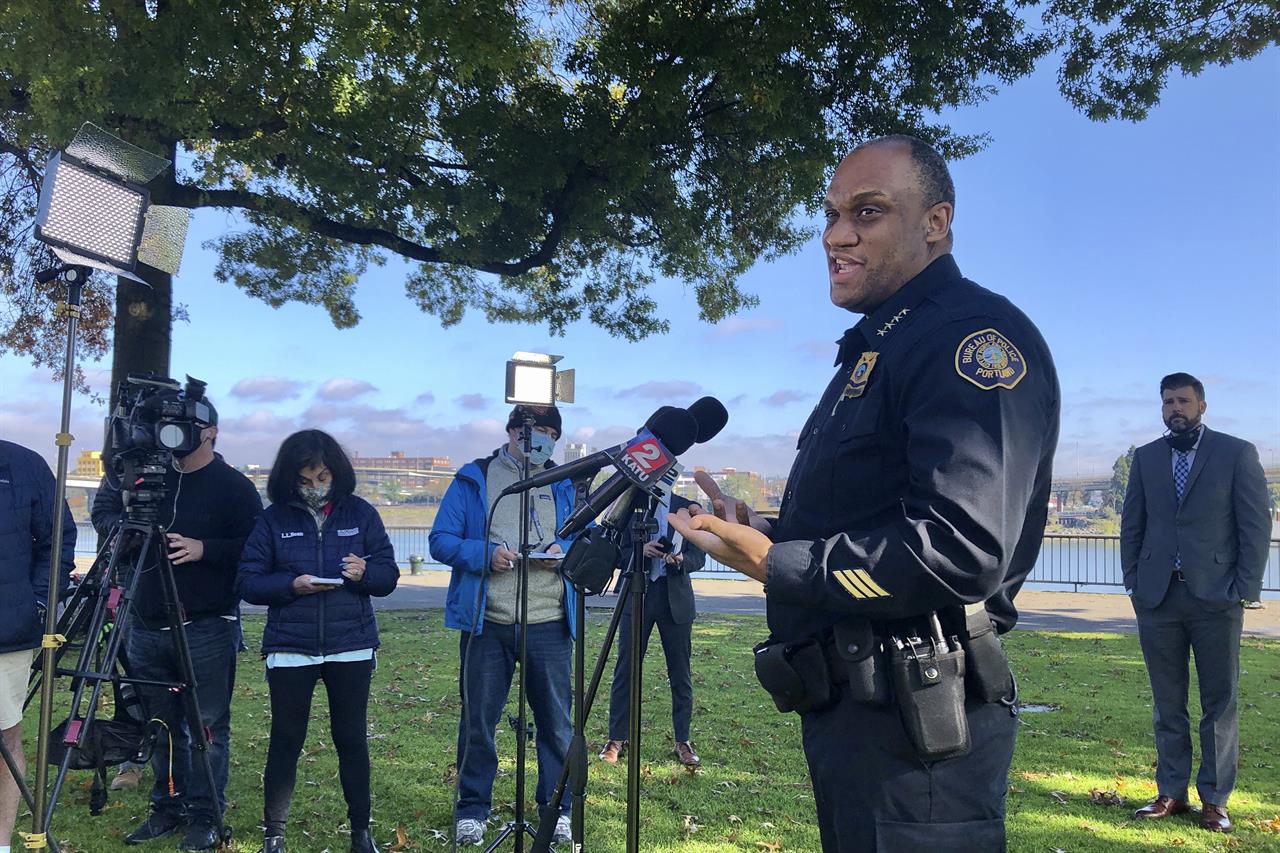 Portland Police Chief Chuck Lovell speaks to reporters about a proposed $18 million in budget cuts to his bureau Thursday, Oct. 29, 2020, in Portland, Ore. The City Council is considering the cuts on top of nearly $16 million already cut in June, but delayed a vote until after the election. (AP Photo/Gillian Flaccus)