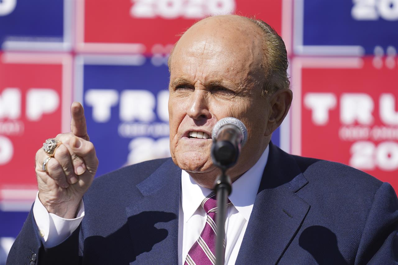 Former New York mayor Rudy Giuliani, a lawyer for President Donald Trump, speaks during a news conference on legal challenges to vote counting in Pennsylvania, Saturday Nov. 7, 2020, in Philadelphia. (AP Photo/John Minchillo)