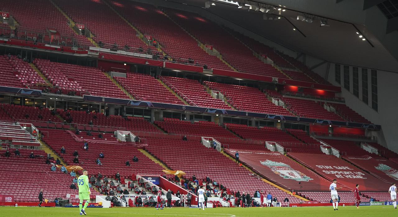 Players in action during the Champions League group D soccer match between Liverpool and Atalanta at Anfield stadium in Liverpool, England, Wednesday, Nov. 25, 2020. (AP Photo/Jon Super, Pool)