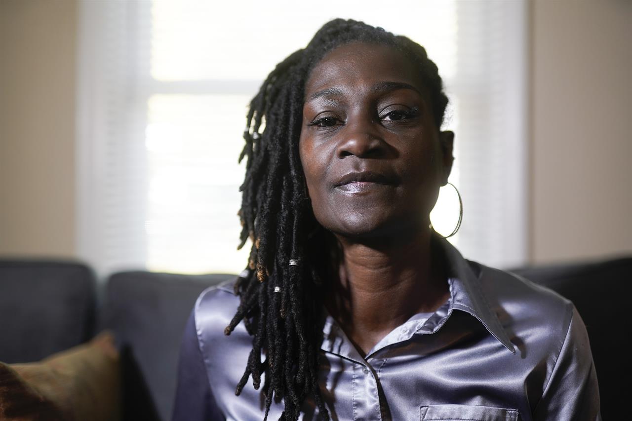 Timika Ingram poses for a picture on Thursday, Nov. 19, 2020, in Charlotte, N.C. A group of Black firefighters in a North Carolina city have filed a grievance over conditions they have endured for more than 30 years. (AP Photo/Chris Carlson)
